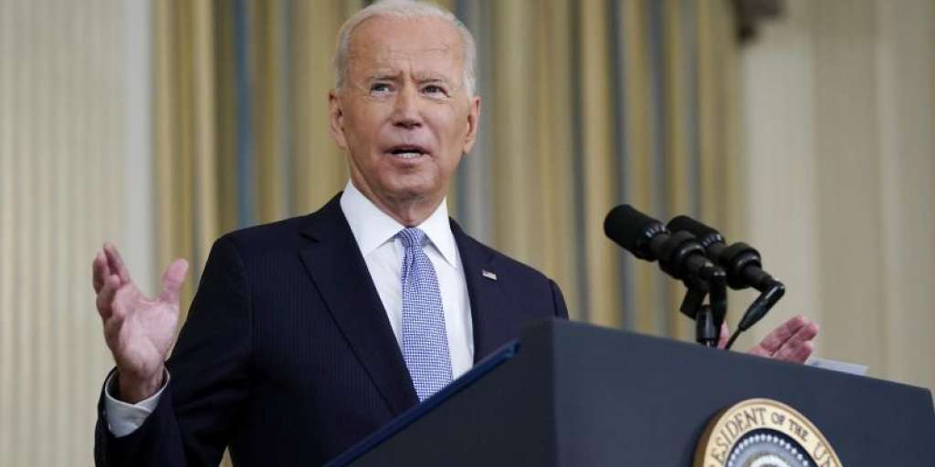 Biden announces investment packages - threatens default