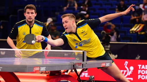 Swedish table tennis players Matthias Falk and Christian Karlsson in the World Cup doubles match.