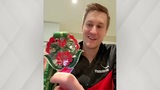 Table tennis vice world champion Matthias Falk shows his silver medal in the camera.