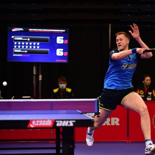 Matthias Falk is a table tennis professional in the World Cup match against Alexandre Cassin with a forehand.