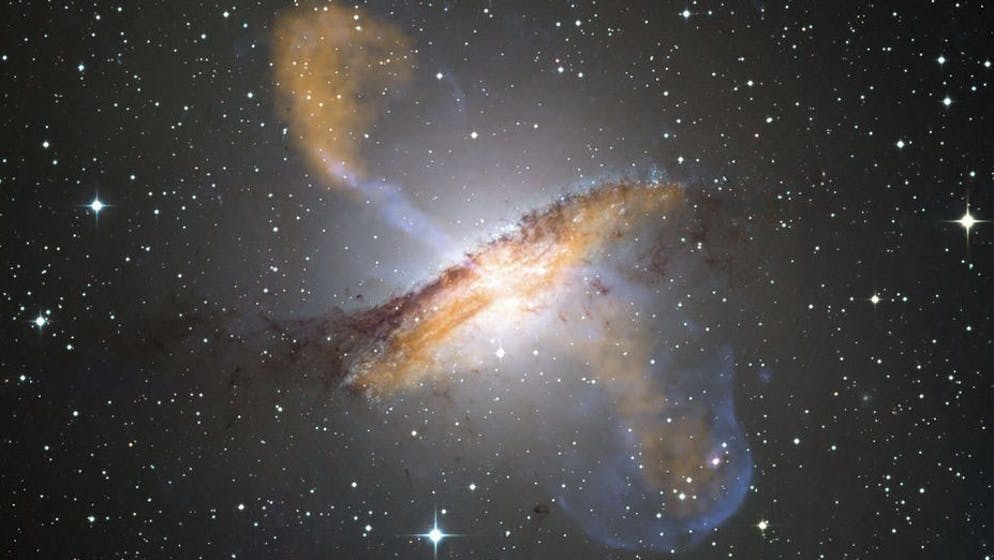 This image provided by NASA shows the most detailed image of jets of particles emanating from a supermassive black hole in the nearby galaxy Centaurus A.  orange) and visual images revealing radio-emitting jets and lobes emanating from Centaurus A's central black hole. (AP Photo/NASA)