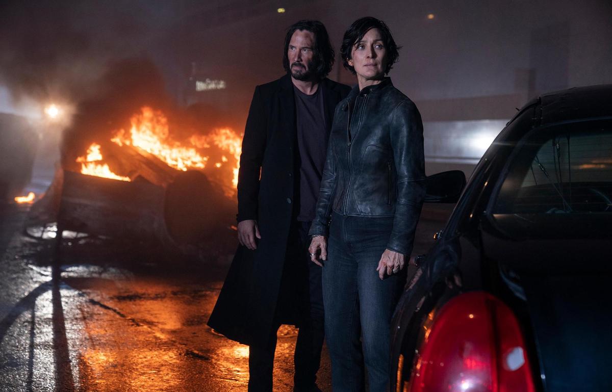 Revolt Against Wrong Life in Wrong: Neo (Keanu Reeves) and Trinity (Carrie Ann Moss) in 
