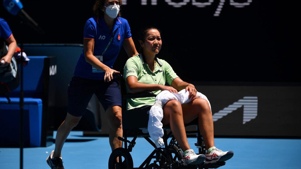 Tennis player Harmony Tan took off the court in a wheelchair
