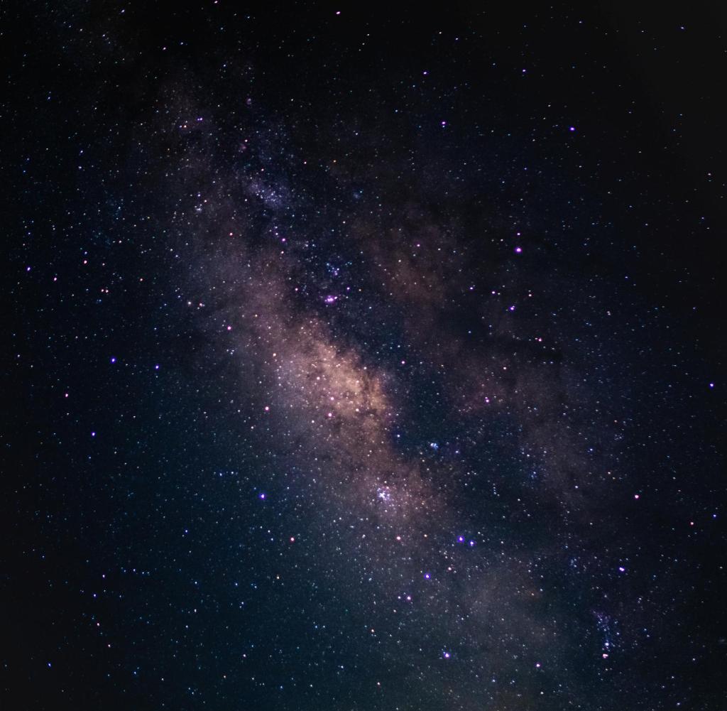 They don't need the Milky Way, sun, or light and can't be seen with the naked eye (Milky Way stock image)