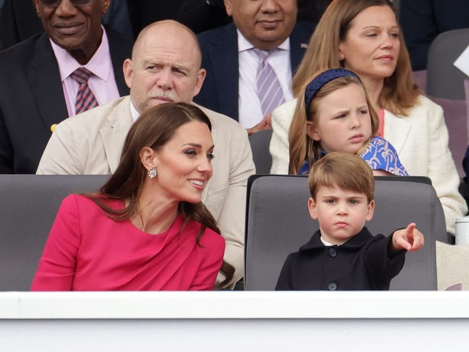 Duchess Kate with her youngest son Louis during the show.