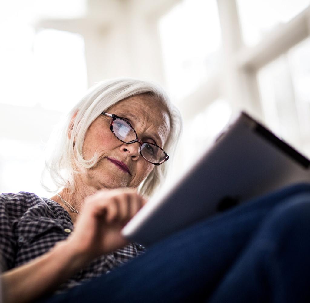 Elderly woman on a tablet
