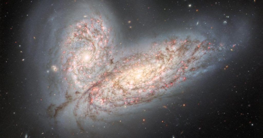 The stunning image shows merging galaxies