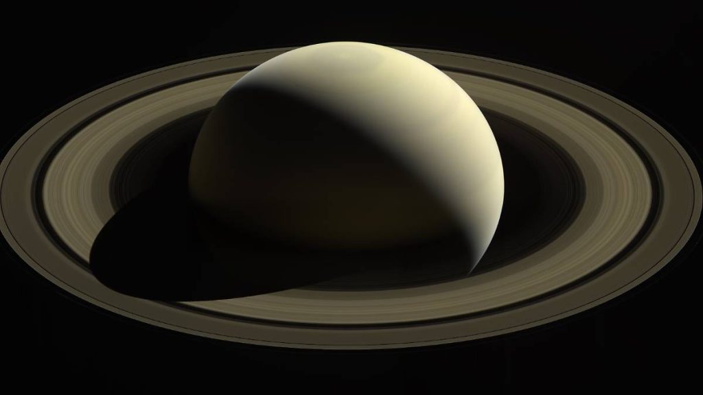 The Disappearance of the Moon: How Saturn's Rings Formed